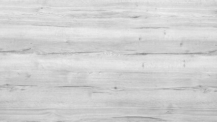 Naklejka premium Weathered wooden surface with visible grain patterns and knots. Textured gray tones suggest aged or rustic material. Ideal for backgrounds in design. Gray wooden texture