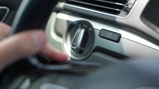 Hand using car turn signal lever indicator slow motion