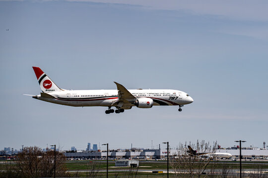 View of Biman Bangladesh Airlines Boeing 787 landing over airport runway area. Toronto, Canada - April 23, 2026.