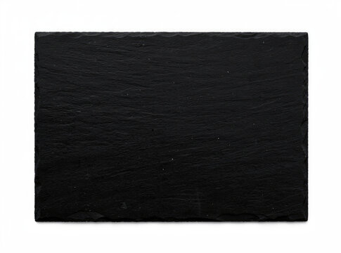 A close-up of a black square stone on a white background
