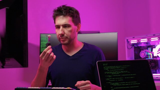 Keyboard modding scene. Closeup of key replacement in vibrant studio setting. Dynamic view of mechanical key modding process illuminated by bright pink studio lighting