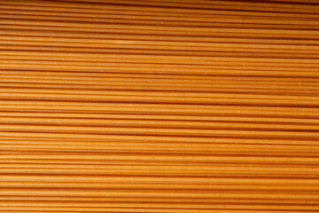 Fototapeta premium Raw Brown Pasta, Wholegrain Spaghetti