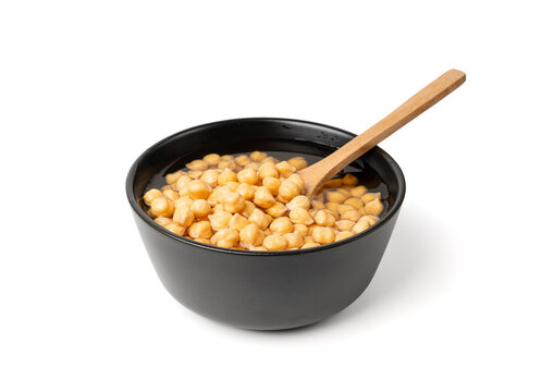 Soaked chickpeas, chick pea in water, swollen wet Cicer arietinum fruits, garbanzo beans cooking