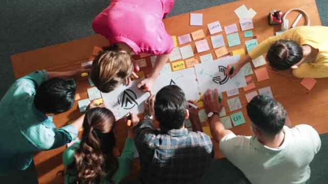 Time lapse of skilled businessman hand choosing color palettes while designing logo graphic. Aerial view of smart interior designer design and select color theme by using color palettes. Symposium.