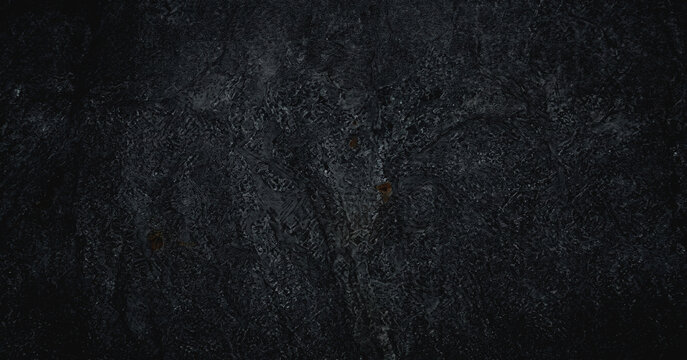 Textured background with a dark, gritty feel, ideal for use in design projects requiring a sophisticated or moody atmosphere.