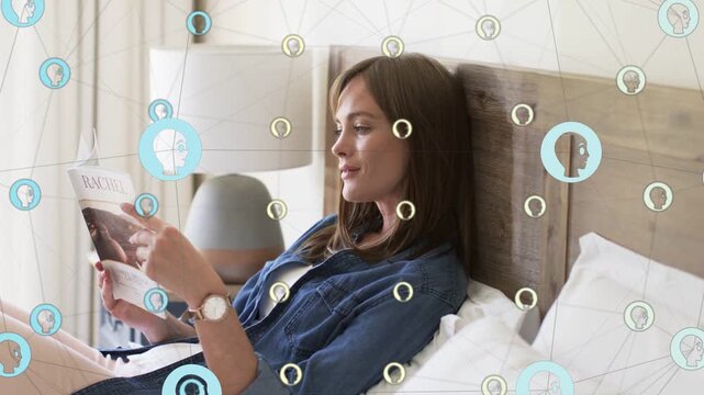 Woman reclining on bed, turning magazine while network icons floating, seeking lifestyle relaxation