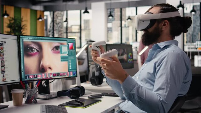 Employee works with VR glasses for photo editing cyberspace techniques in office, retouching color with virtual reality gadget in commercial agency studio. VR headset in post production.