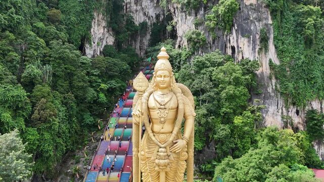 Batu Caves - indian temple near Kuala Lumpur. Malaysia religious landmark. Lord Murugan statue.