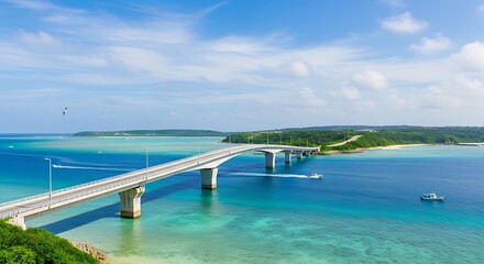 Obraz premium Scenic bridge spans turquoise waters under a bright blue summer sky