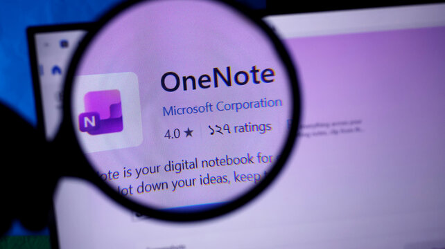 Magnifying glass on microsoft onenote app on computer screen closeup