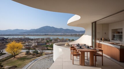 Fototapeta premium Modern balcony overlooking landscape with table and chairs on a sunny day