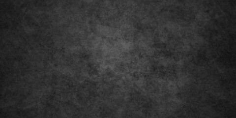 Dark charcoal grunge wall texture background. Dark black rough grunge surface with smoke edge. Black texture chalk board and black board. © MDFAIMIDULISLAM