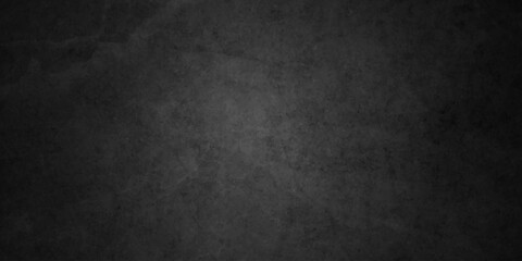 Dark charcoal grunge wall texture background. Dark black rough grunge surface with smoke edge. Black texture chalk board and black board. © MDFAIMIDULISLAM