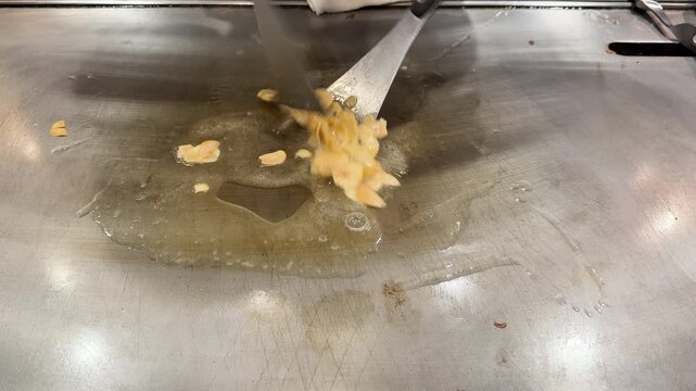Barbecue meat on the grill. Grill chef searing steak on an open flame grill