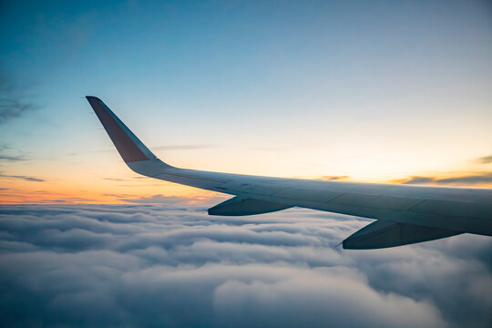 The wing of an airplane during flight