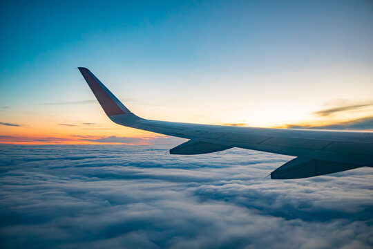 The wing of an airplane during flight