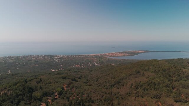 Aerial Panning Shot of Korission Lagoon and Sandy Coastline in Corfu Greece