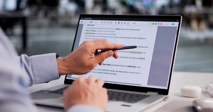 Hispanic Man Meticulously Editing Laptop Document For Spelling