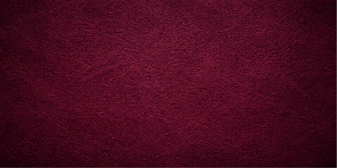 Fototapeta premium A rough red leather surface featuring a vintage grunge texture and weathered material pattern creates a blank old textile backdrop suitable for a wallpaper design
