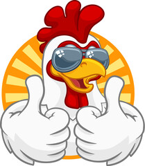 A chicken rooster cockerel bird cartoon character in cool shades or sunglasses giving a double thumbs up © Christos Georghiou