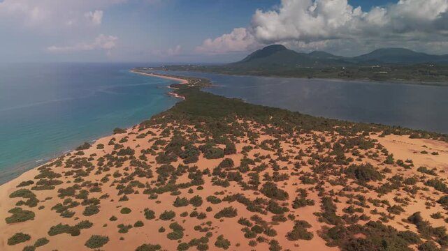Aerial Drone Flight Towards Issos Beach Sand Spit Between Ionian Sea and Korission Lagoon