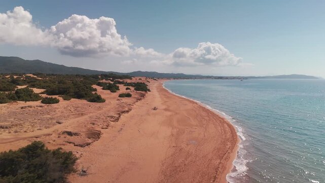 Aerial Drone Flight Over Long Sandy Issos Beach and Coastal Dunes in Corfu Greece