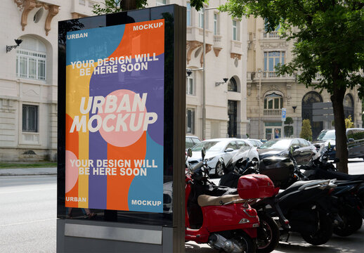 urban panel mockup is displayed on a busy street in Madrid, surrounded by parked vehicles and local architecture, ready for advertising.