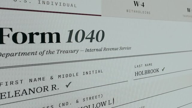 Process of filling the Form 1040 giving personal data