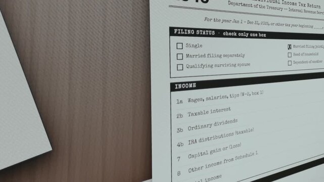 IRS Form 1040, stamp APPROVED being applied