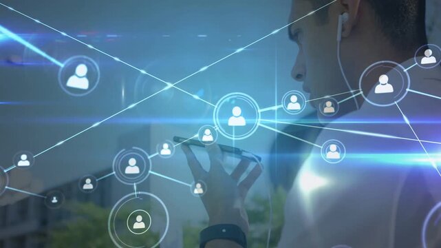 Man holding smartphone near mouth activating circular UI visualizing tech network obscuring man