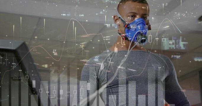 Running athlete wearing grey tight top, blue metabolic mask and tubes on treadmill, chart overlay