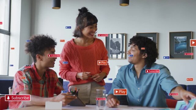 Design team reviewing prints, left man tapping tablet making red play and blue info badges floating