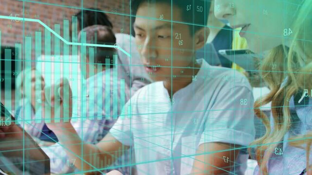 Male and female team swiping tablet and tapping phones causing teal charts showing business data