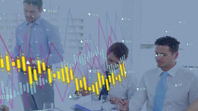 Presenter pointing to board generating animated financial charts as team taking notes for decisions