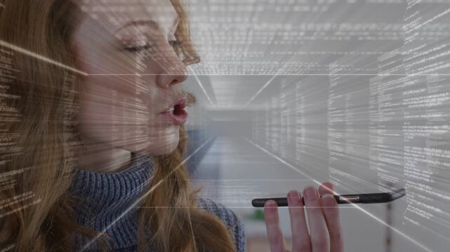 Woman holding phone speaking and initiating voice command for data, tunnel overlay scrolling code