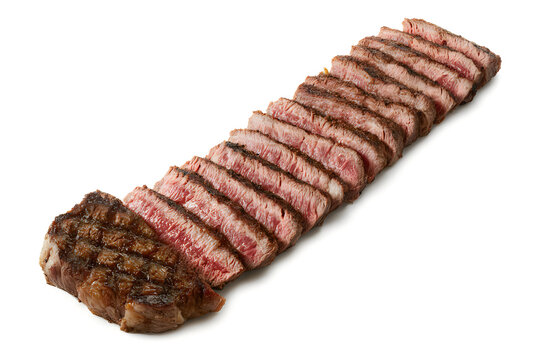 A long row of sliced grilled beef steak showing medium rare pink centers on a white background