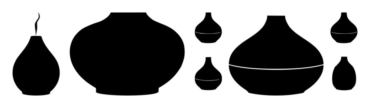 Aromatherapy oil diffuser set with solid black icon on white background featuring aromatherapy, oil, diffuser with wellness and relaxation