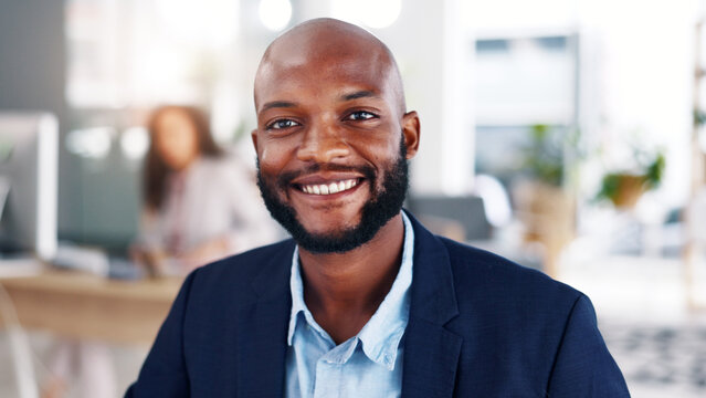 Office, portrait and businessman with smile, ambition and real estate agent with career development. Corporate, realtor and person with investment opportunity, happy and pride for business growth