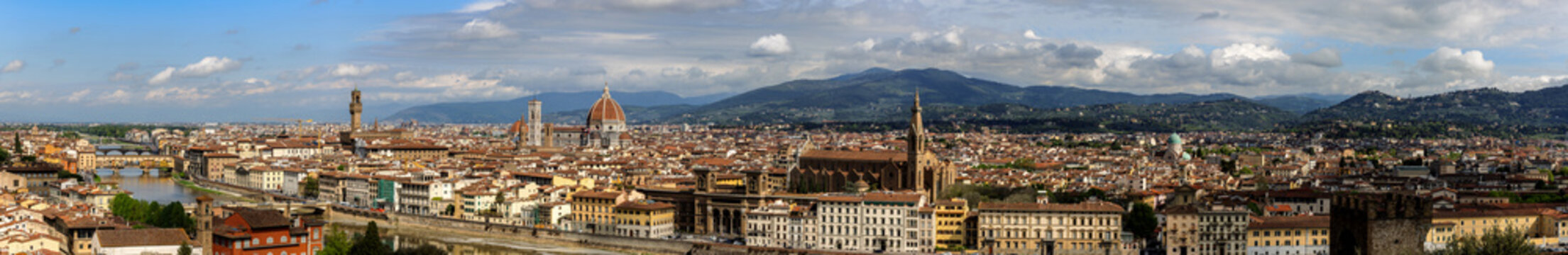 View over the Arno river, the Palazzo Vecchio and the Florence Cathedral in Florence, Tuscany, Italy, on a sunny day in spring.