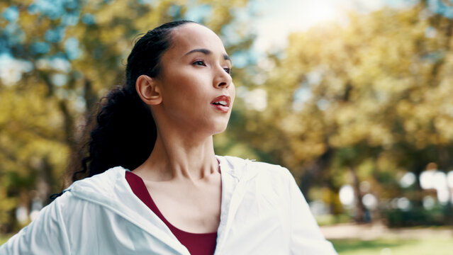 Serious, woman and thinking of fitness at park, tired and rest after workout or training in morning. Outdoor, runner and person in nature post exercise, reflection and cool down on break and wellness