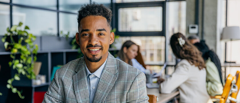 Dynamic business founder presenting in professional office environment