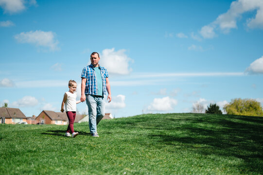 A walk through the park with dad, copy space