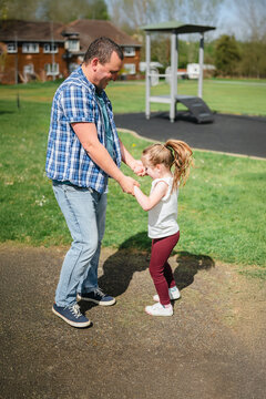 Parenting and education, father and daughter outdoors