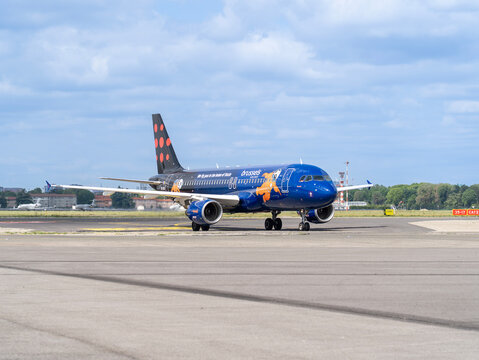 Brussels Airlines (Tintin Gravity Livery) Airbus A320 airplane taxis at LIN Milano Linate international airport
