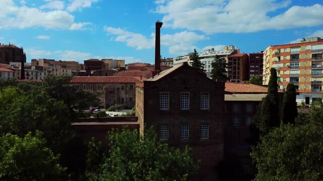 Rising aerial view of a spanish city skyline