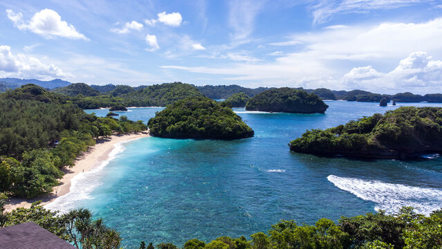 Aerial View of Tropical Hidden Beach and Small Islands in East Java Indonesia