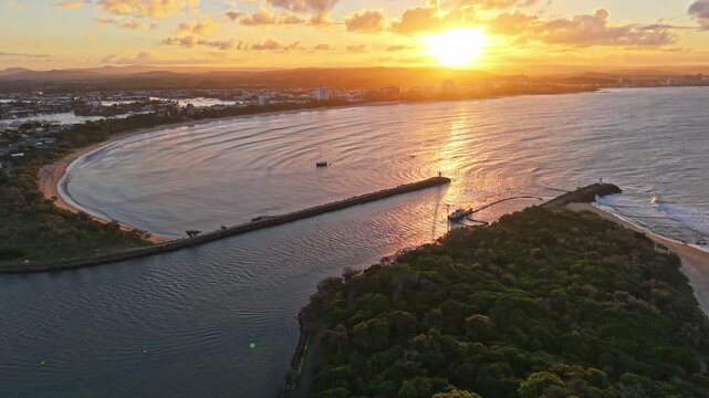 Panoramic aerial sunrise over Mooloolaba River mouth and coastline, Sunshine Coast Queensland