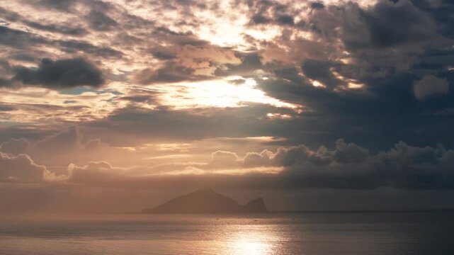 Aerial views of the Guishan Island with clouds. Flying above the clouds