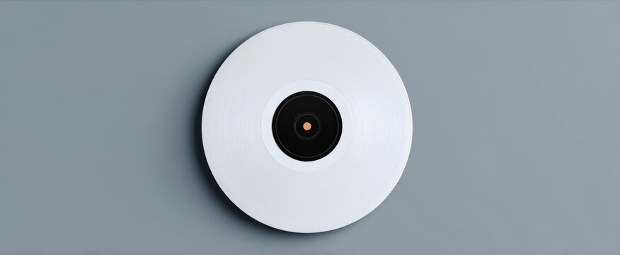 White vinyl record shines like a musical moon amidst a light gray sky ready for DJs