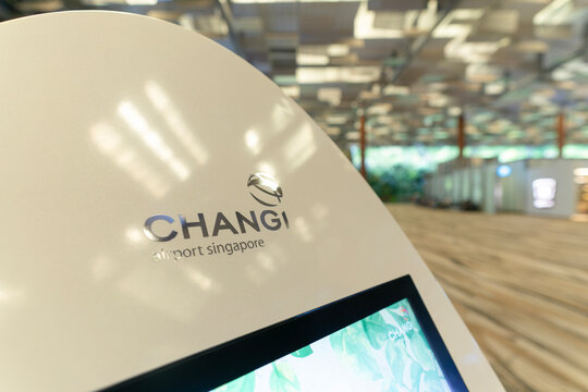 Close up of Changi Airport logo on check-in kiosk